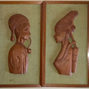 Vintage mid century carved teak wood wall art of African man and woman